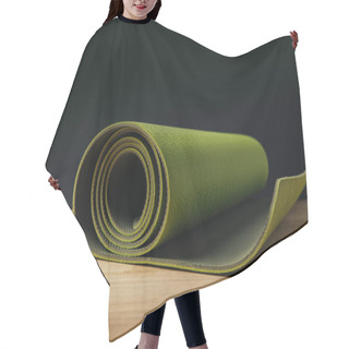 Personality  Green Rolled Yoga Mat On Wooden Surface On Black Hair Cutting Cape