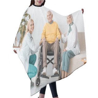 Personality  Young Female Doctor Sitting With Senior Patients In Clinic Hair Cutting Cape