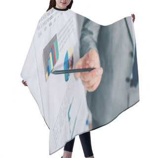 Personality  Cropped View Of Businessman Pointing With Pencil At Graphs On Flipchart On Blurred Background  Hair Cutting Cape