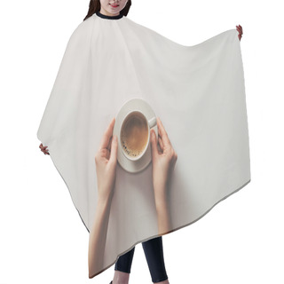 Personality  Top View Of Female Hands And Cup Of Coffee With Saucer On Grey Hair Cutting Cape