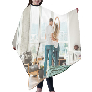 Personality  Back View Of Young Couple Standing At Window Hair Cutting Cape