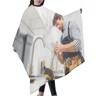 Personality  Selective Focus Of Plumber Holding Metal Pipe Near Kitchen Faucet And Tools On Worktop  Hair Cutting Cape