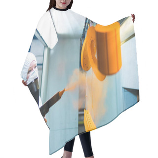 Personality  Powder Coating Of Metal Parts. A Woman In A Protective Suit Sprays Powder Paint From A Gun On Metal Products Hair Cutting Cape