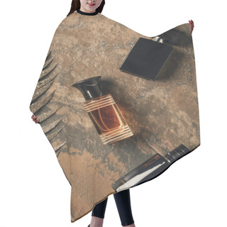 Personality  Top View Of Bottled Perfumes And Decorative Golden Leaves On Brown Weathered Surface   Hair Cutting Cape