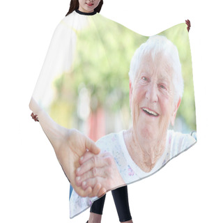 Personality  Senior Woman Holding Hands With Caretaker Hair Cutting Cape