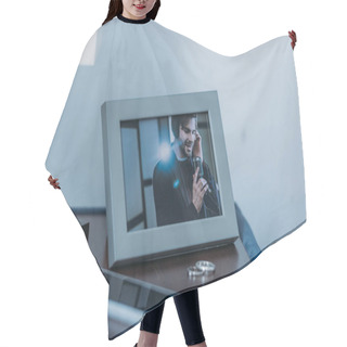 Personality  Selective Focus Of Photo Frame With Picture Of Man, Marriage Rings And Smartphone On Table Hair Cutting Cape