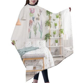 Personality  Close To Nature Bright Bedroom Interior With A Bed Covered With White Sheets And Marine Blanket. Green Plants On Shelves Next To The Bed. Real Photo. Hair Cutting Cape