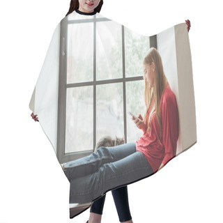 Personality  Young Woman Sitting On Window Sill With Cat And Using Smartphone  Hair Cutting Cape