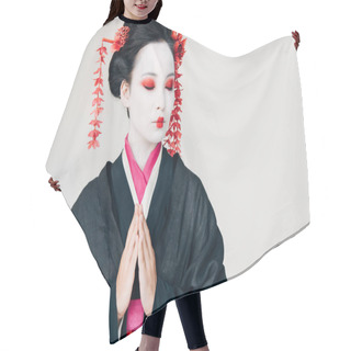 Personality  Beautiful Geisha In Black Kimono With Red Flowers In Hair And Greeting Hands Isolated On White Hair Cutting Cape