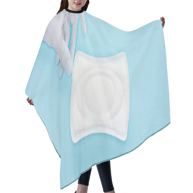 Personality  Top View Of White Paper Hand Holding Cotton Sanitary Towel On Blue Background, Panoramic Shot Hair Cutting Cape