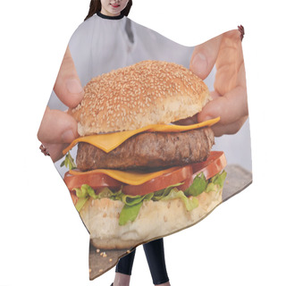Personality  Hands Holding And Preparing Hamburger. Hair Cutting Cape