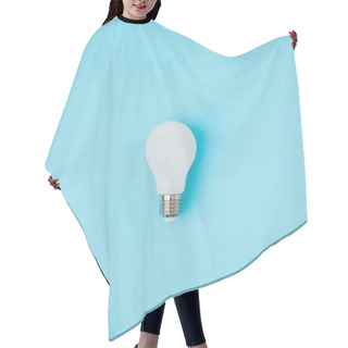 Personality  Close Up View Of White Light Bulb Isolated On Blue Hair Cutting Cape