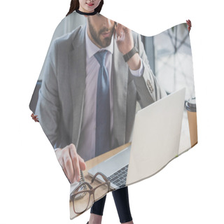 Personality  Cropped Shot Of Businessman Talking By Smartphone And Using Laptop In Office Hair Cutting Cape