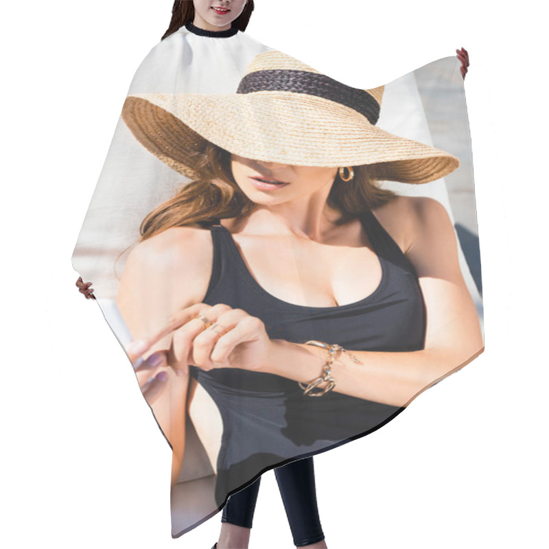 Personality  Girl In Swimming Suit And Straw Hat Lying On Sun Bed And Using Smartphone On Resort Hair Cutting Cape