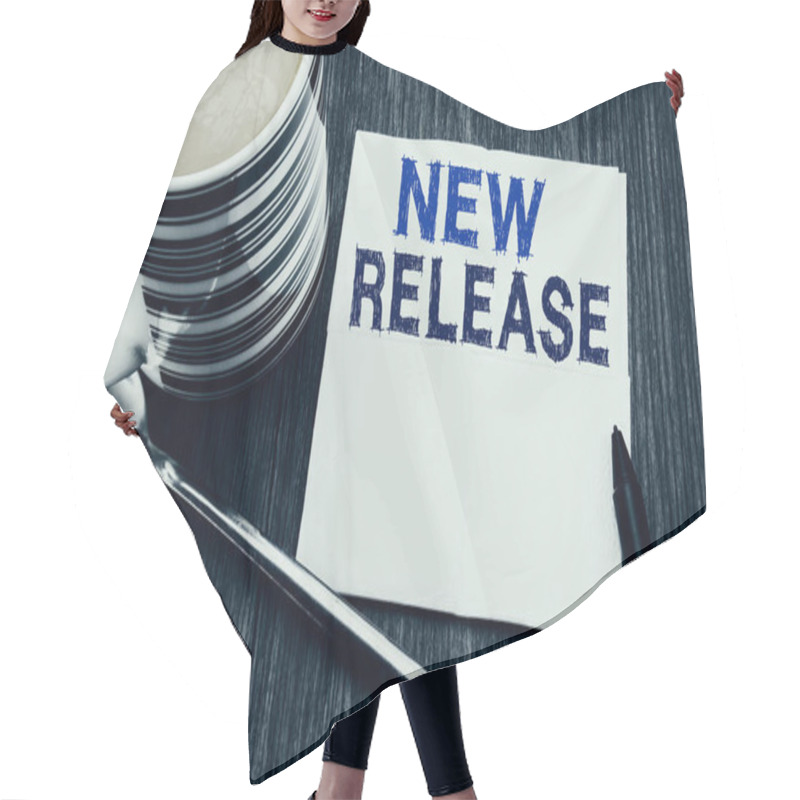 Personality  Handwritten Text Showing New Release . Business Concept For Technology Software Update Written On The Tissue Paper Handkerchief On The Wooden Wood Background. With Marker And Coffee. Office Top View. Hair Cutting Cape