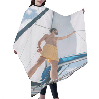 Personality  Low Angle View Of Shirtless Muscular Man In Swim Trunks Adjusting Sail On Yacht  Hair Cutting Cape