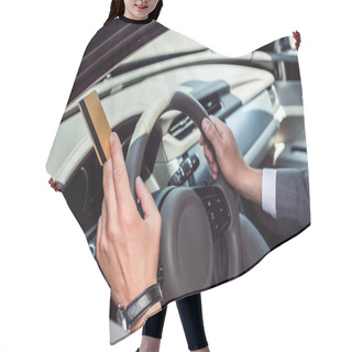 Personality  Partial View Of Businessman With Credit Card In Hand Sitting At Steering Wheel In Car Hair Cutting Cape