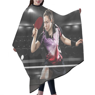 Personality  Young Pretty Sporty Girl Playing Table Tennis On Black Background. Action Shot. Hair Cutting Cape