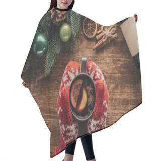 Personality  Cropped Image Of Woman Holding Cup Of Mulled Wine At Wooden Table With Christmas Fir Twigs Hair Cutting Cape