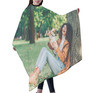 Personality  Selective Focus Of Laughing Woman In Raincoat Playing With Jack Russell Terrier In Park  Hair Cutting Cape