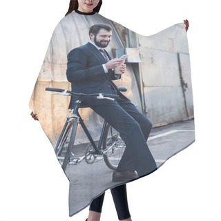 Personality  Smiling Businessman With Coffee To Go Using Smartphone While Leaning On Bicycle On Street Hair Cutting Cape