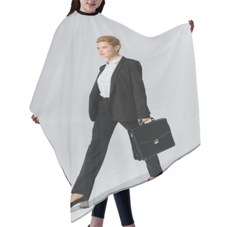 Personality  Full Length Of Confident Businesswoman Looking Ahead While Walking With Briefcase On Grey Background Hair Cutting Cape