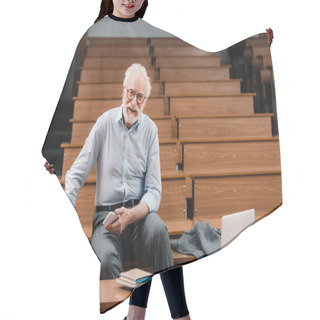 Personality  Smiling Grey Hair Professor Sitting In Empty Lecture Room Hair Cutting Cape