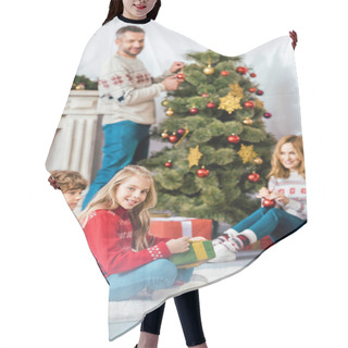 Personality  Parents And Kids Spending Time Together On Christmas At Home Hair Cutting Cape