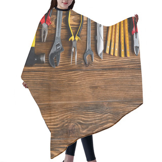 Personality  Top View Of Different Tools On Wooden Surface, Labor Day Concept Hair Cutting Cape