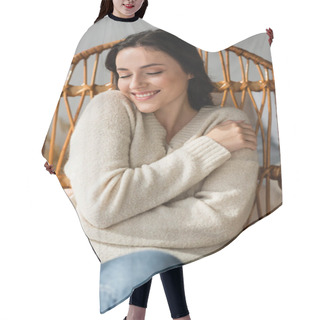 Personality  Smiling Woman In Cozy Sweater Hugging Herself In Wicker Chair Hair Cutting Cape