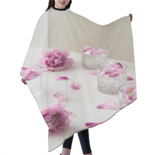 Personality  Crystal Glasses With Tonic And Floral Petals Near Pink Peonies On White Tabletop And Grey Background Hair Cutting Cape