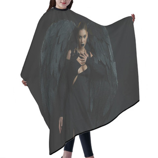 Personality  Sexy Woman In Costume Of Fallen Angel With Dark Wings Looking At Camera On Black, Halloween Concept Hair Cutting Cape