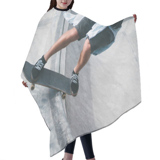 Personality  Cropped Image Of Skater Hair Cutting Cape