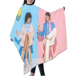 Personality  African American Man Presenting Flowers In Ice Cream Cone To Girlfriend While Sitting On Chairs Against Pink And Blue Wall Backdrop Hair Cutting Cape