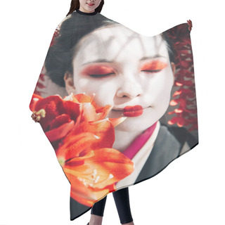 Personality  Portrait Of Beautiful Geisha Holding Red Flowers In Sunlight Hair Cutting Cape