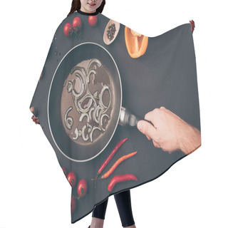 Personality  Cropped Image Of Man Holding Frying Pan Above Gray Table Hair Cutting Cape