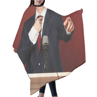 Personality  Cropped View Of Man Pointing With Finger On Tribune On Red Background Hair Cutting Cape