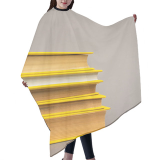Personality  Stack Of Yellow Notebooks Isolated On Grey Hair Cutting Cape