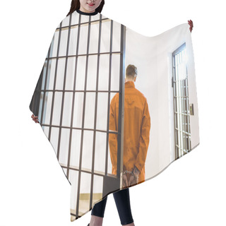 Personality  Back View Of Prisoner Standing In Handcuffs In Corridor Hair Cutting Cape