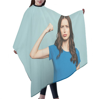 Personality  Serious Girl Demonstrating Power While Looking At Camera On Blue Background Hair Cutting Cape