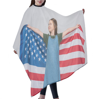 Personality  Patriotic Preteen Girl Smiling While Holding Huge Flag Of America During Memorial Day Isolated On Grey  Hair Cutting Cape