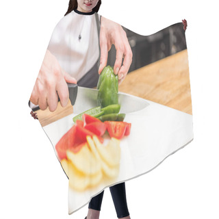 Personality  Cropped Image Of Chef Cutting Colored Bell Peppers  Hair Cutting Cape