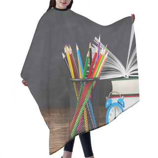 Personality  Stack Of Books, Pencil Pot And Clock On Wooden Table Against Blackboard Background, Copy Space Hair Cutting Cape