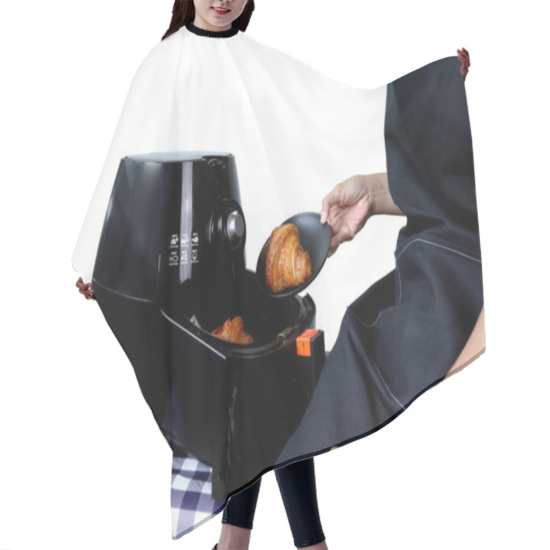 Personality  Right Hand Of Lady Model Puts The Croissant Into The Black Oil - Free Air Fryer Machine On The Table In The White Kitchen Cement Wall Background Hair Cutting Cape