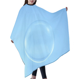 Personality  Glass Ball On Blue Background. Hair Cutting Cape