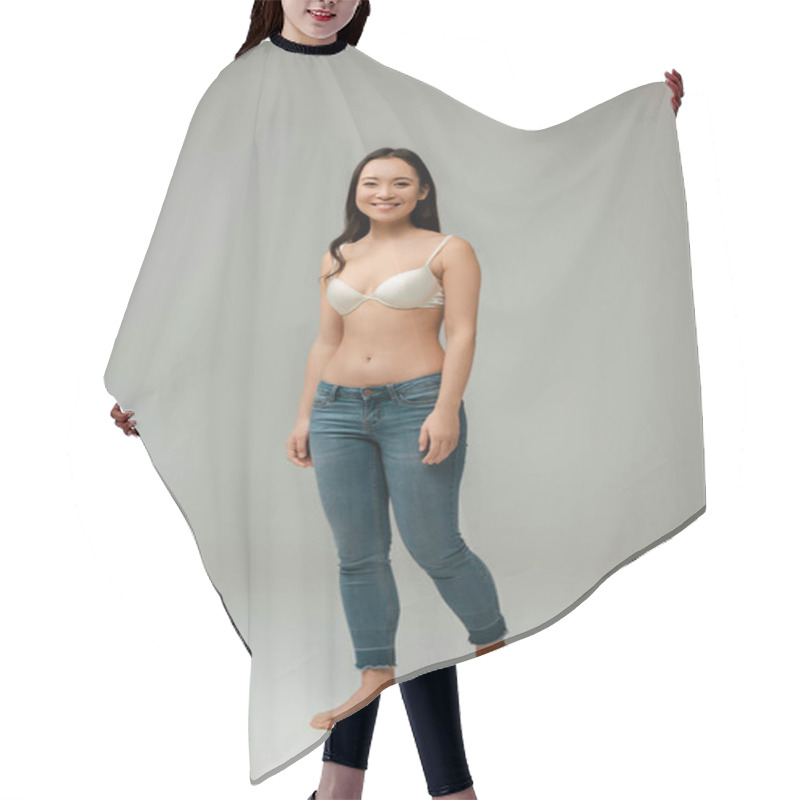 Personality  happy overweight asian girl standing on grey hair cutting cape