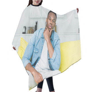 Personality  African American Man Looking At Camera, Sitting On Sofa Hair Cutting Cape