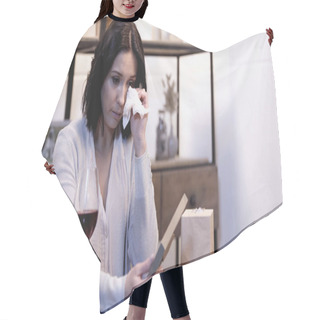 Personality  Upset Woman Holding Photo Frame And Wiping Tears With Paper Napkin At Home Hair Cutting Cape