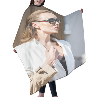 Personality  Beauty Blond Woman Standing Outdoors At Daytime. Portrait Of Stylish Model Wearing Beige Croak, White Suit And Sunglasses  Hair Cutting Cape
