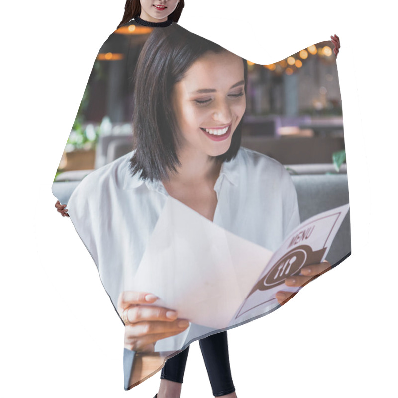 Personality  Selective Focus Of Cheerful Woman Sitting In Sushi Bar And Looking At Menu  Hair Cutting Cape